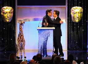 Robert Downey Jr presents Ben Stiller with his Britannia Award