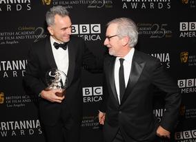 Daniel Day-Lewis enjoys a moment with Steven Spielberg, backstage at the 2012 Britannia Awards.