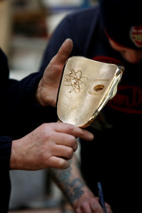 The hollow reverse of the mask bears an electronic symbol around one eye and a screen symbol around the other, linking dramatic production and new technology in the art forms of the moving image (BAFTA / Marc Hoberman).