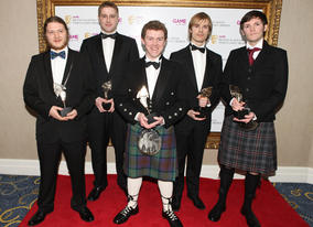 The Butterflyers team display their BAFTA Ones to Watch Award in Association with DARE to be Digital for their innovative platfom game Shrunk! (BAFTA/Steve Butler).