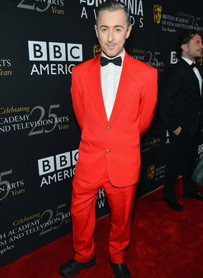 Alan Cumming arrives to host the Awards for the fourth time.