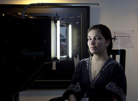 An audience member trials a piece of new technology between the day's sessions.