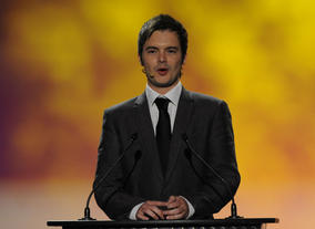 Host Barney Harwood kicks off the ceremony. Pic: BAFTA/Steve Finn