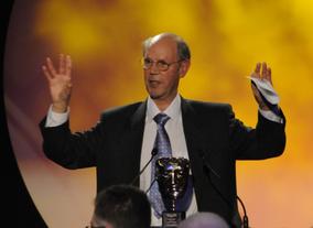The 77-year-old accepts the Special Award, given in recognition of his exceptional contribution to children's television, including Play School and Trumpton. (Pic: BAFTA/ Steve Finn)