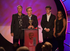 Winners John White, Derek Brown and David Watson of L8R Youngers 2, with Josephine Melville.