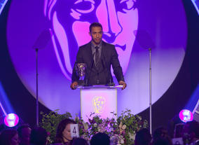 Ukweli Roach presents the Award for Original Music.