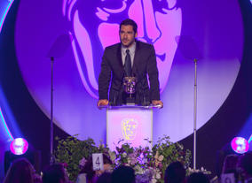 Actor Tom Ellis presents the Award for Director: Multi-Camera sponsored by The Farm LA