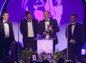 John Mooney, Jeremy Child, Howard Bargroff and Doug Sinclair pick up the BAFTA for Sound: Fiction. 