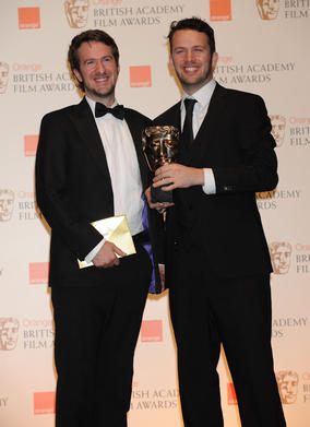 Short Animation winner Michael Please (r). (Pic: BAFTA/Richard Kendal)