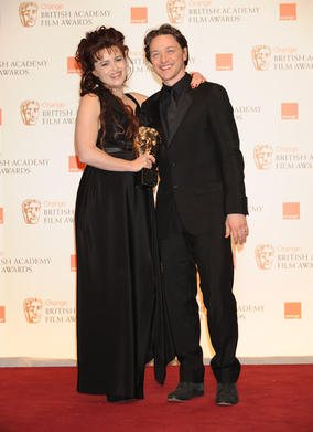 Presenter James McAvoy with The King's Speech's Supporting Actress winner Helena Bonham Carter. (Pic: BAFTA/ Richard Kendal)