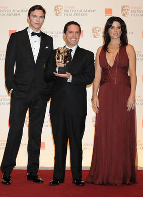 Nicholas Hoult and Neve Campbell with Animated Film winner Lee Unkrick. (Pic: BAFTA/ Richard Kendal)