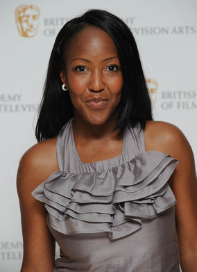 Angellica Bell poses for photographers before heading backstage to interview the winners for bafta.org.