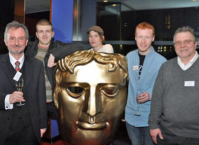 BAFTA Mentors John McShane (left) and Jerry Brannigan (right) with young scriptwriters from Glasgow Youth Film Festival.