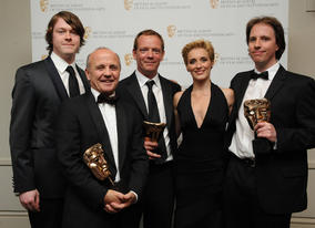 The winning team behind the Arctic episode of Human Planet, with presenters Vicky McClure and Daniel Rigby. (Pic: BAFTA/Chris Sharp)