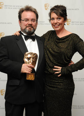 BAFTA-winning editor Charlie Phillips, who won for the A Study In Pink episode of Sherlock, with presenter Olivia Colman. (Pic: BAFTA/Chris Sharp)