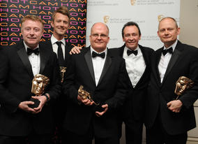Presenter Paul Whitehouse with the winning team behind ITV's The Cube. (Pic: BAFTA/Chris Sharp)