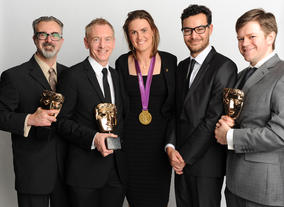 Olympic rower Heather Stanning with the winning team behind Share A Story 2011, including Dave Hickman, Carl Hadley and David Heslop.