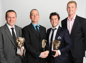 Presenter Alex Gregory with Video Game winners Paul Reiche, Roy Stackhouse and Ian McClellan for Skylanders Spyro's Adventure.
