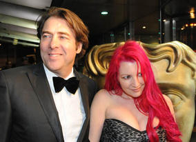 Jonathan Ross arrives at the London Hilton Hotel with wife Jane Goldman (BAFTA / James Kennedy).