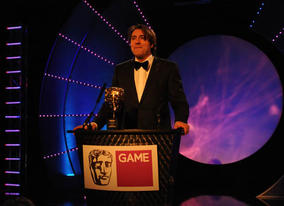 TV presenter and comedian Jonathan Ross introduces the illustrious career of Fellowship recipient, Nolan Bushnell (BAFTA / James Kennedy). 