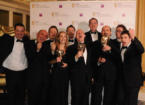 Peter Molyneax, Dene Carter and Louise Copley received the Action and Adventure Award for Fable II from Danny Wallace (BAFTA / James Kennedy). 