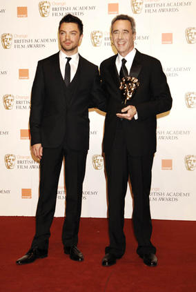 Jim Morris received Best Animated Film Award for Wall-E from Dominic Cooper at the Orange British Academy Film Awards in 2009