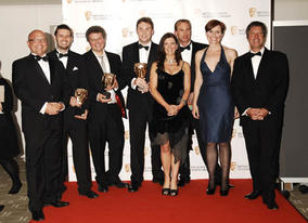 The Production team of Embarassing Bodies Online with citation readers John Torode and Gregg Wallace pose for the photogrpahers after winning the Interactivity Award (BAFTA / Richard Kendal).