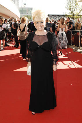 Small but perfectly formed, Barbara Windsor took to the red carpet in a black Chloe dress (BAFTA/Richard Kendal). 