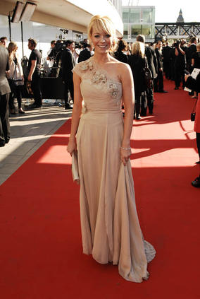 Liz McClarnon of Celebrity Master Chef dazzled the waiting fans with a striking Philip Armstrong dress and Boodles jewellery (BAFTA / Richard Kendal).