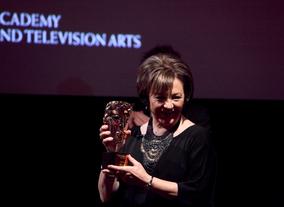 Delia shows off her BAFTA Special Award