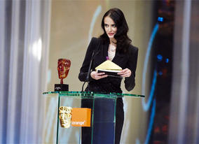 Orange Rising Star Award winner in 2007, Eva Green, presents the award in 2008 to Shia Labeouf (pic:BAFTA / Camera Press).