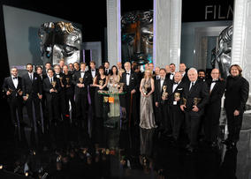 All of the evening's winners pose with host Jonathan Ross (right) to mark the 64th Orange British Academy Film Awards