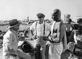 Producer/Director Richard Attenborough and actor Ben Kingsley on the set of Gandhi (1982)