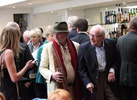 Lewis chats with audience members in the BAFTA members bar before the show