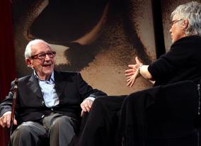 Telling the audience about his brushes with Hollywood greats including Alfred Hitchcock and Orson Wells