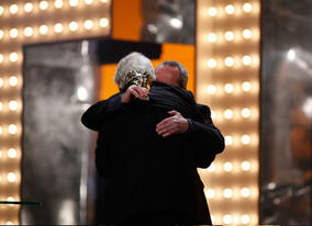 Joe Dunton joins Terry Gilliam on stage to receive the honour of the Outstanding British Contribution to Cinema (BAFTA/Brian Ritchie).