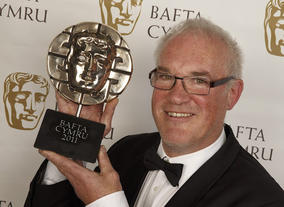 Journalist and sports commentator Eddie Butler was presented with the award for Writer for Lion '71