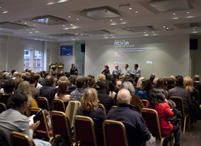 Louisa introduces the panel - [L-R] Juliette Howell (Head of Working Title Television, UK), Ben Cavey (Head of Entertainment, Tiger Aspect), Huw Kennair-Jones, (Commissioning Editor, Drama, Sky), and Gregor Sharp (Executive Comedy Editor, BBC)