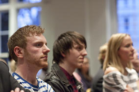 The pitchers wait patiently for their turn in front of the panel.