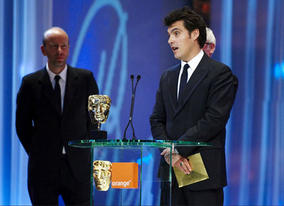 Director Joe Wright collects the Best Film BAFTA for Atonement.