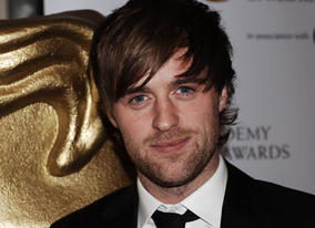 Jonas Armstrong, currently gracing the screen as the star of Robin Hood, arrives on the red carpet