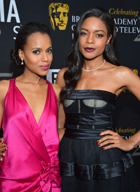 Actress Kerry Washington and Bond star Naomie Harris strike a red carpet pose.