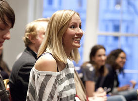 Laura Deeley reacts to some extra feedback after she's taken her seat.
