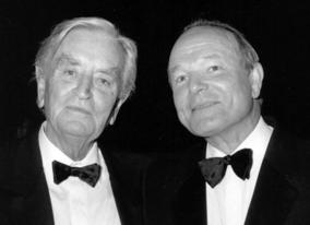 Sir David Lean with Sir Sydney Samuelson at a dinner held in honour of Sir David Lean, 1988, in Cannes.