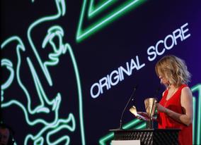 TV personality Edith Bowman takes to the stage to indroduce the category of Original Score (BAFTA/Brian Ritchie)