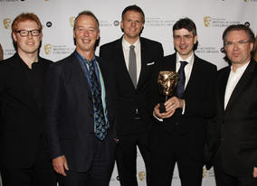 Representatives of the winner of Independent Production Company of the Year, Astley Baker Davies, with citation reader Jake Humphrey.