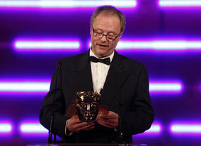 Llewellyn, who recently reprised his role as Kryten in classic comedy Red Dwarf, introduces the Technical Innovation award. (Pic: BAFTA/Brian Ritchie