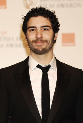 Tahar Rahim accepts the award for Film Not in the English Language on behalf of A Prophet (BAFTA/Richard Kendal).