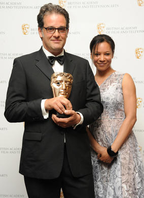 Actress Nina Sosanya with BAFTA-winning production designer Tom Bowyer. (Pic: BAFTA/Chris Sharp)