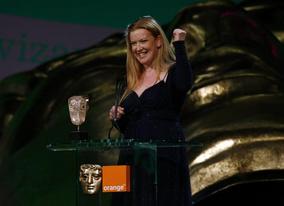 Andrea Arnold collects the Carl Foreman Award for her film Red Road (BAFTA / Brian Ritchie).
